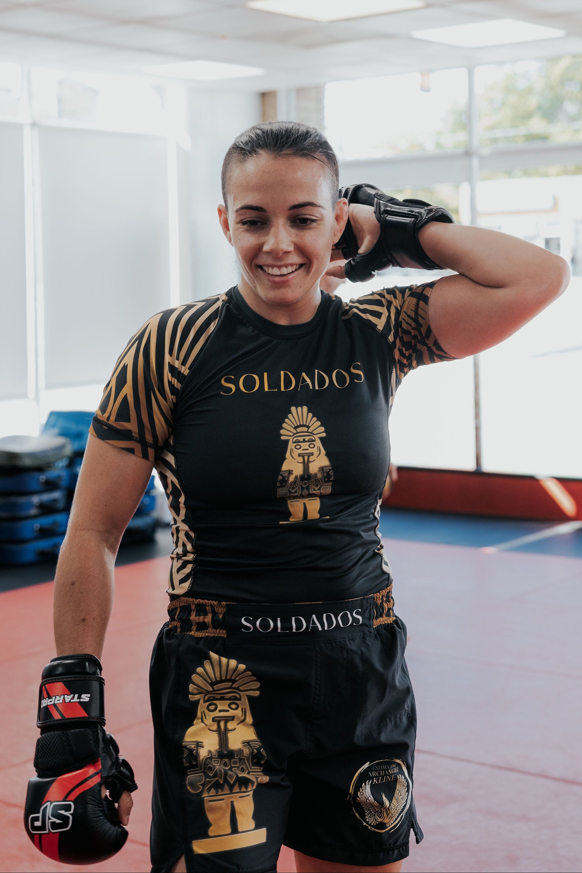 <img src="soldados-mma-rash-guard-unisex-fatima-kline.jpg" alt="Fatima Kline wearing MMA rash guard unisex by Soldados Coffee x ILSV Apparel Co.">