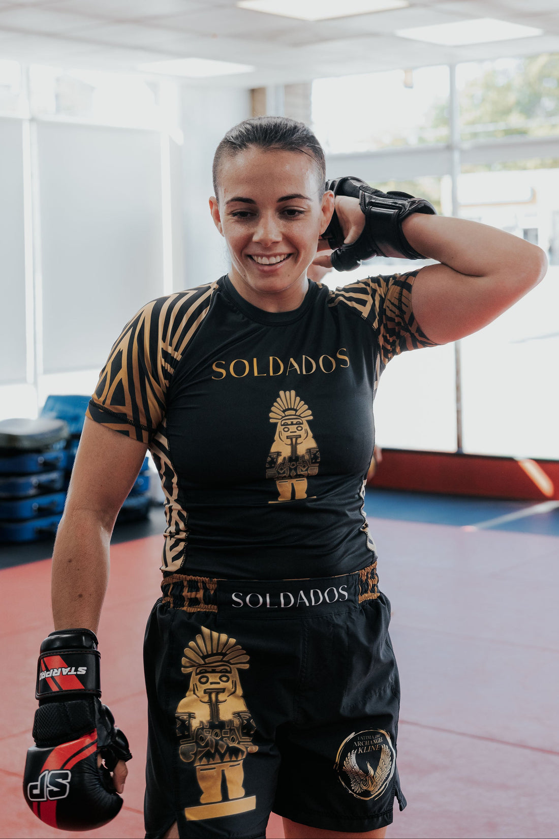 <img src="soldados-mma-rash-guard-unisex-fatima-kline.jpg" alt="Fatima Kline wearing MMA rash guard unisex by Soldados Coffee x ILSV Apparel Co.">